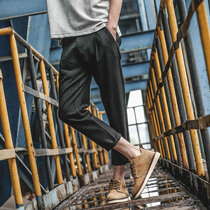 LMTNZD spring and summer tide micro-elastic nine-point pants mens black casual pants youth British simple slim small pants