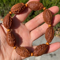 Suk olives nuclear hand strings cabbage 100 chaise hand strings hand-carved iron nuclear olives nuclear hatchery chaise strings male Yuhua nuclear