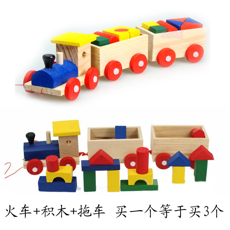 Children dragging toy train building blocks toddlers pulling rope pulling rope pulling rope 1-2-3 years old boy pulling snail