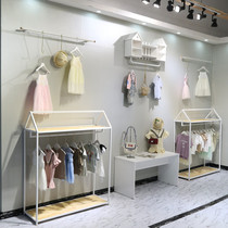Clothing store display stand on the wall shelf childrens clothing store creative floor-standing white Nakajima rack running water table free typesetting