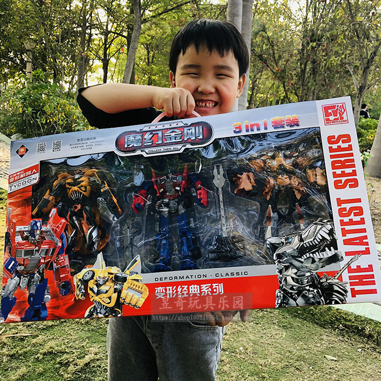 Large gift box deformation toy Superman weapon dinosaur steel cable King Kong aircraft children 61 boy car