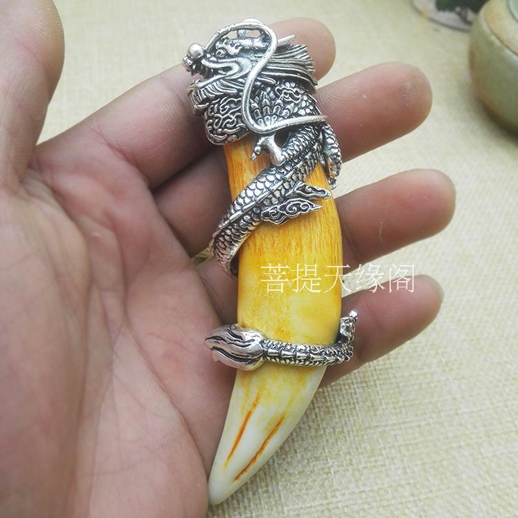Natural wild boar teeth Tibetan silver dragon head decoration to ward off evil
