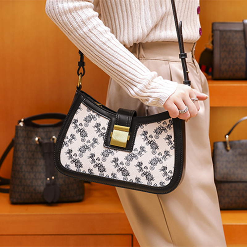 French light extravagant brand DUDK women's bag fashion 100 hitch high level sensuel satchel bag with single shoulder and hand small French stick bag