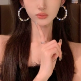 Дизайнерские серьги, модный аксессуар, тренд сезона, 2025 года