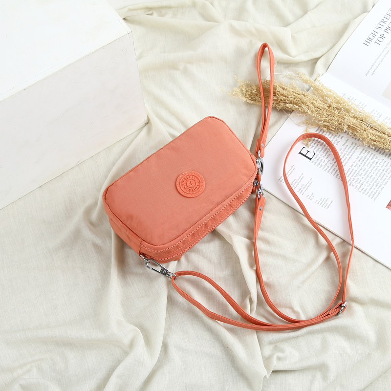 Women's messenger bag small lightweight hand-held Oxford cloth waterproof simple and versatile multi-pocket mobile phone passport change mini bag