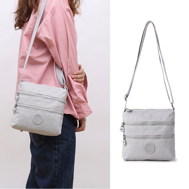 Crossbody bag women's vertical nylon cloth water-repellent simple, versatile, lightweight, multi-pocket, casual shopping, one-shoulder small cloth bag