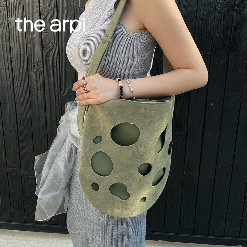 The Arpi Suede Perforated Bag Shoulder Strap Crossbody Bag Single Shoulder Bag Large Capacity Handbag Women's Bag The Arpi Suede Perforated Bag Shoulder Strap Crossbody Bag Single Shoulder Bag Large Capacity Handbag Women's Bag