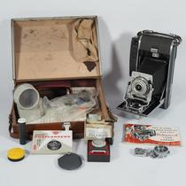 Nostalgic antique old object Polaroid 110A leather cavity folding organ camera flash leather case
