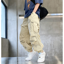 Boy card with its color work style pants 2021 new spring dress day system foreign gas loose big pocket CUHK child casual pants tide
