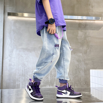 2021 new spring clothing jeans boy harbor wind breaking holes washed up with foreign air personality relaxation CUHK Casual Pants Tide