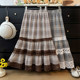 French lace stitching hollow contrast plaid skirt for women autumn 2025 high waist A-line loose cake long skirt