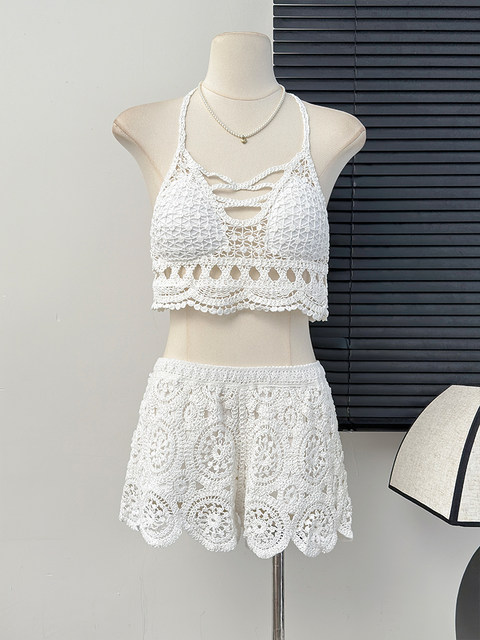 Beach vacation fashionable casual suit, feminine hollow knitted camisole, high-waisted wide-leg shorts two-piece set