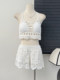 Beach vacation fashionable casual suit, feminine hollow knitted camisole, high-waisted wide-leg shorts two-piece set
