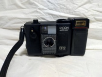 Price leaked: Ricoh EF2 flash works with power. Appearance as shown. Three lenses.
