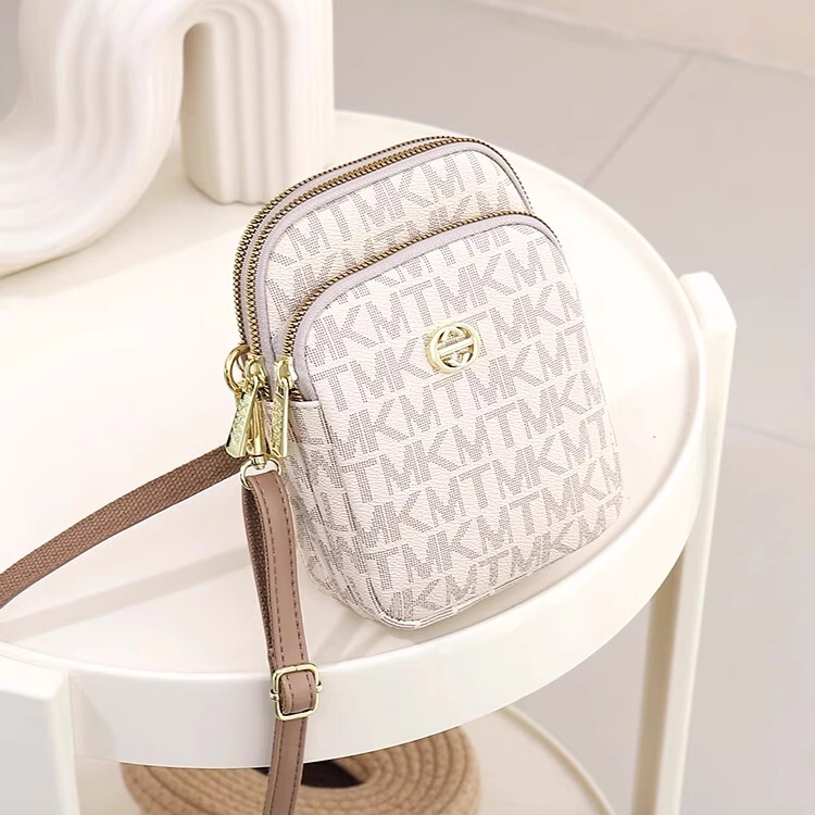 American Genuine Mk Jessie Leather Phone Bag for Women 2026 New Model Mini Small Bag Multi-Pocket Crossbody Bag American Genuine Mk Jessie Leather Phone Bag for Women 2026 New Model Mini Small Bag Multi-Pocket Crossbody Bag