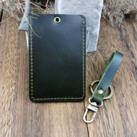 Темно -зеленый капюшон