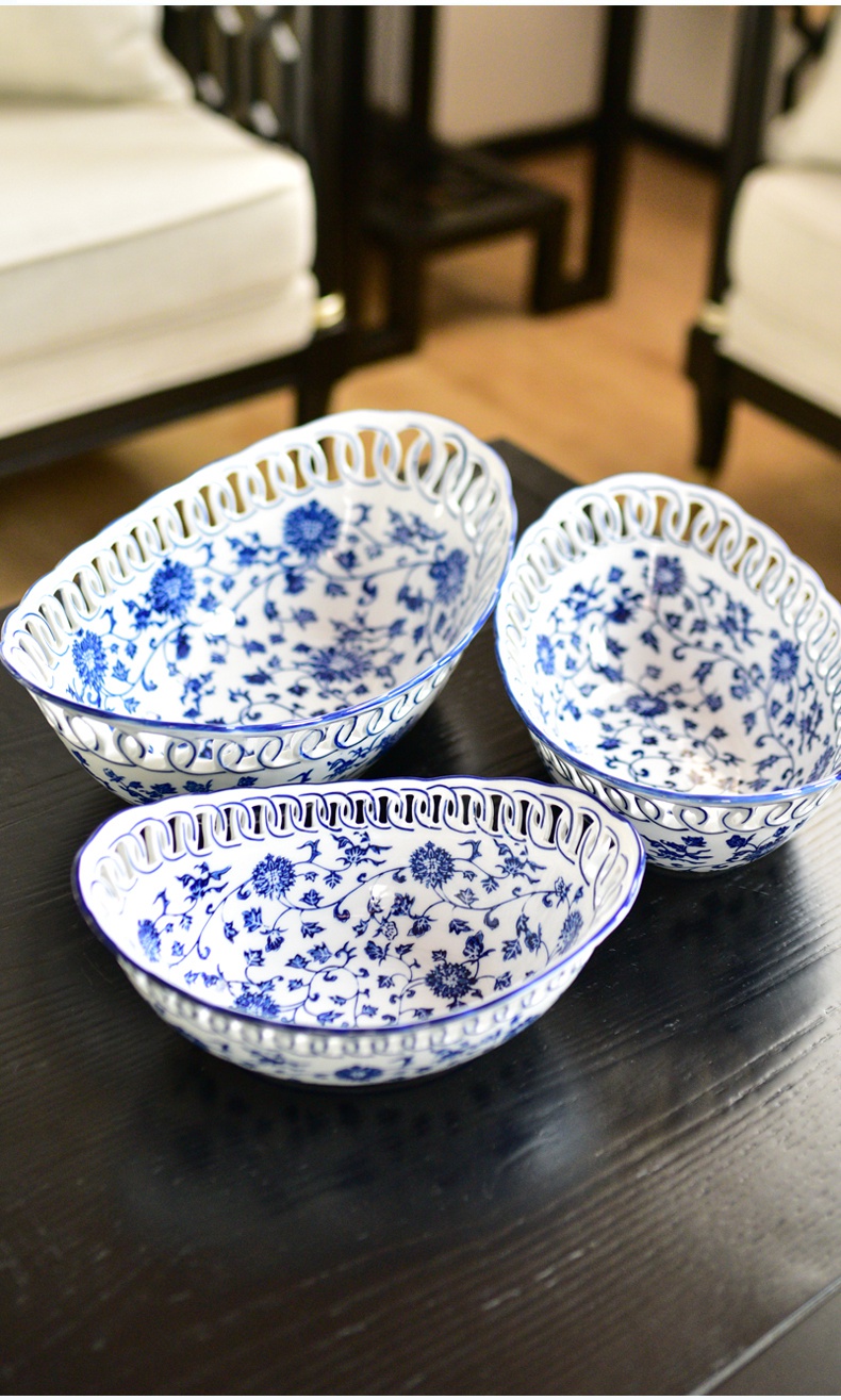 New Chinese style restoring ancient ways of jingdezhen blue and white porcelain ceramic hollow out fruit bowl dried fruit tray table sitting room adornment is placed