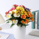 Simulated artificial flowers and green plants decorative leaves and begonia flowers