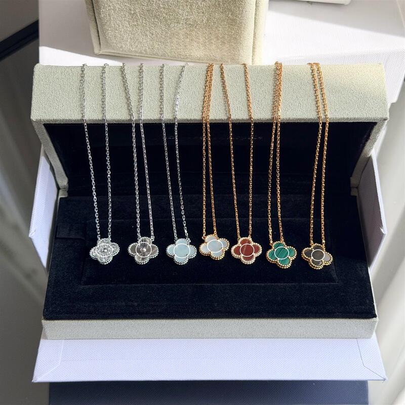Four-Leaf Clover Necklace Wrapped in 18K Rose Gold and Platinum with Laser-Cut Red and Purple Chalcedony, White Mother-Of-Pearl, and Blue Agate for Holiday Gifts Four-Leaf Clover Necklace Wrapped in 18K Rose Gold and Platinum with Laser-Cut Red and Purple Chalcedony, White Mother-Of-Pearl, and Blue Agate for Holiday Gifts