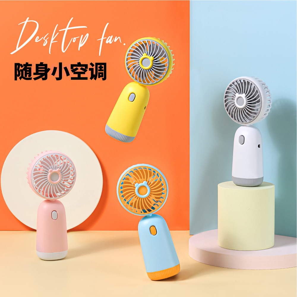 Light riding hand-held fan USB charging student dormitory desktop fan cute contrast color portable mini fan