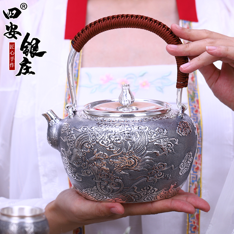 Yunlong silver pot pure hand - made high - grade relief 999 kettle Japanese silver tea gear household Silver Zhuang