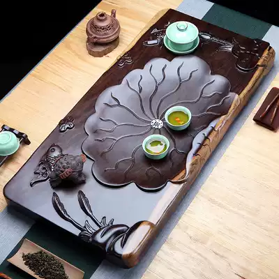 Whole ebony log tea tray Solid wood tea table tray Kung Fu tea set Tea sea household drainage carving