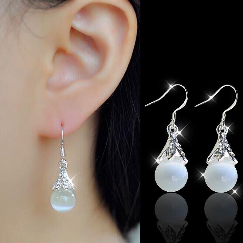 Korean Version Cat Eye Stone Earrings Female Fashion Temperament 100 Hitch-style Temperament Drop Earrings Ornament 