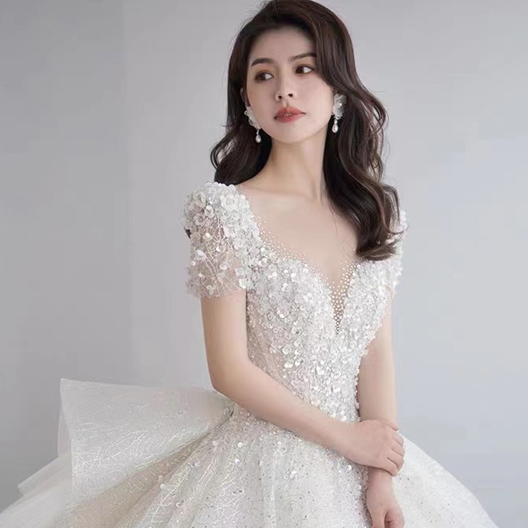 One-shoulder wedding dress 2022 new bride retro high-end pregnant woman small simple French long tail main yarn