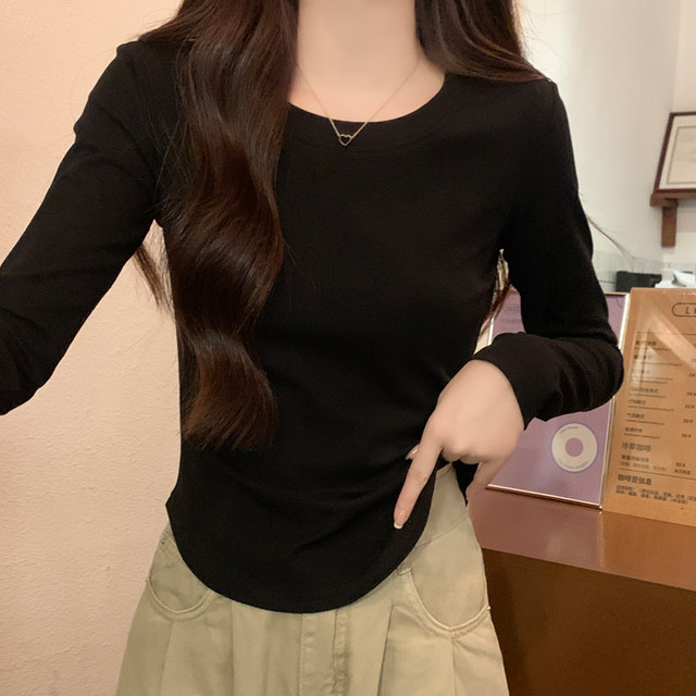 Solid color round neck German velvet plus velvet basic bottoming shirt for women in autumn and winter irregular hem waist slim short top trendy