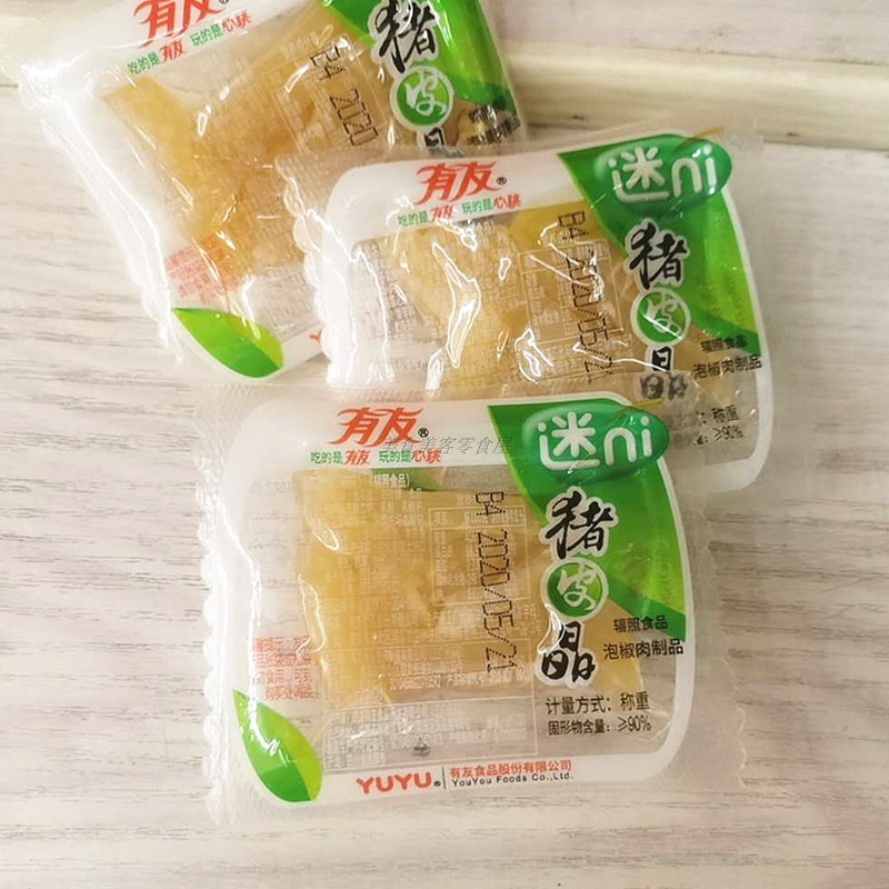 Youyou fan ni pickled pepper pig skin crystal small package weighing 500g Spicy ready-to-eat meat snacks Chongqing specialty
