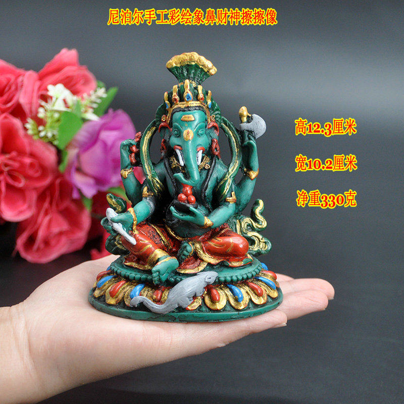 ネパールで手描きされた、富と知恵の神であり、障害を取り除く象の頭を持つガネーシャ像は、高さ12.3cmです。