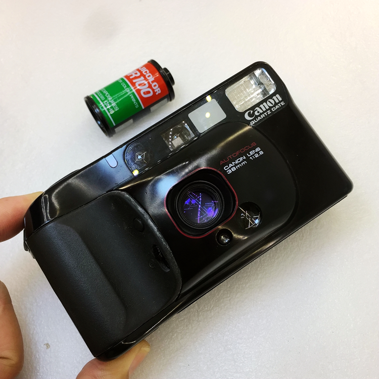 Canon Autoboy 3 film camera repair and maintenance, the shutter does not respond and the film is stuck and cannot advance.