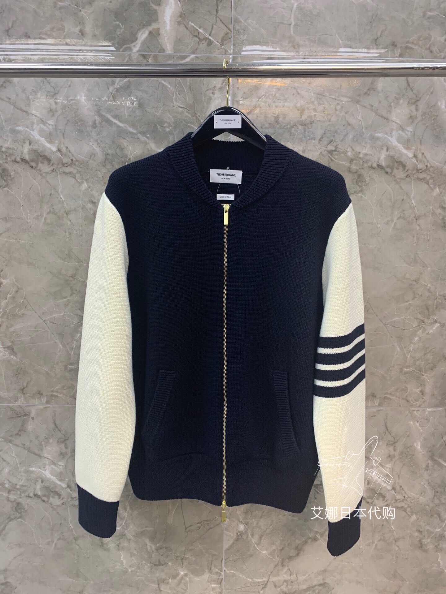 Thom Browne 20 Spring and Summer TB four - track lamb knitted sweater outside of TB