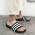 Dép mùa hè nam phiên bản Hàn Quốc dày dưới đáy kéo sọc xu hướng đôi giày đi biển nữ trượt dép thời trang