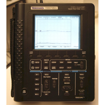 Tektronix Tek handheld with a multimeter THS730A oscilloscope THS730A oscilloscope