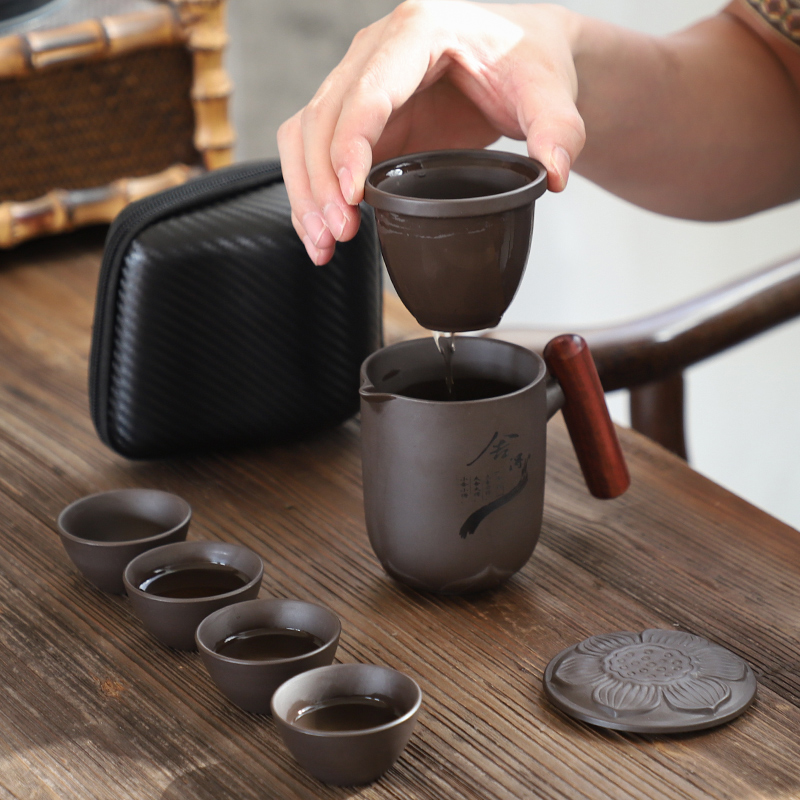 Portable kung fu tea set a pot of four cups of ceramic household violet arenaceous crack cup car travel is suing the tea set