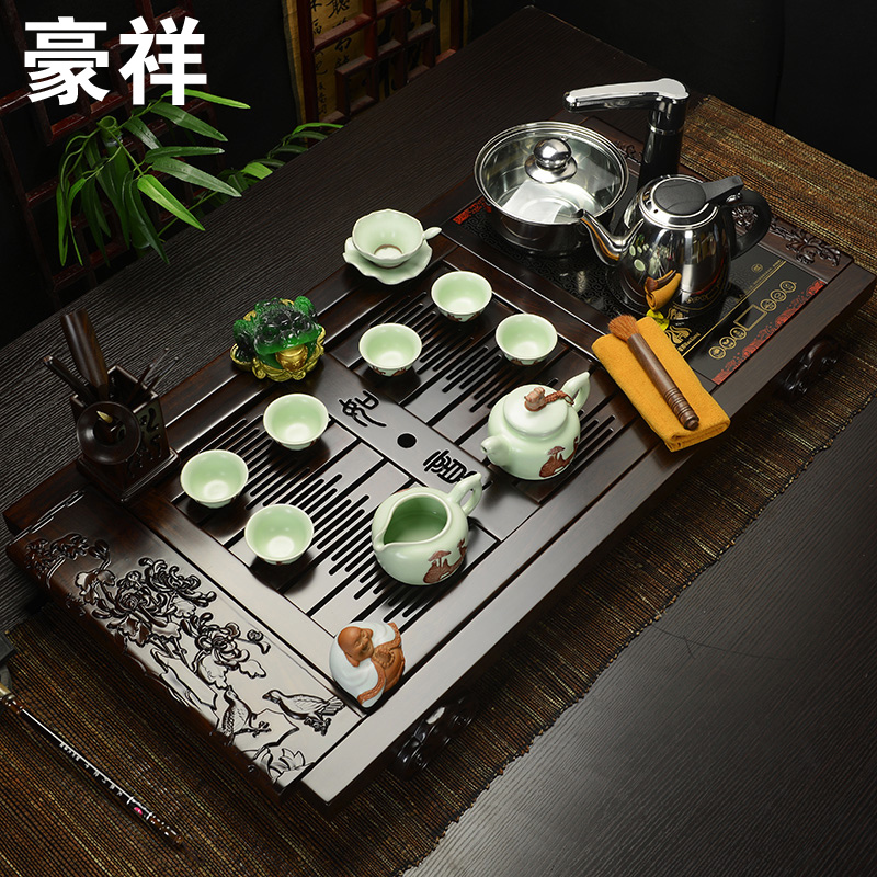 Howe auspicious solid wood tea tray of a complete set of suit induction cooker suit purple ice crack kung fu tea set four unity