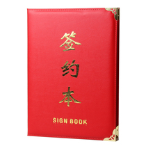 Red signing this leather contract folder signing this agreement folder business contract.