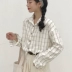 Mùa thu 2018 phiên bản Hàn Quốc của áo sơ mi dài tay kẻ sọc mới nữ buông thả hoang dã sinh viên chạm đáy áo sơ mi Hồng Kông áo sơ mi nữ Áo sơ mi dài tay