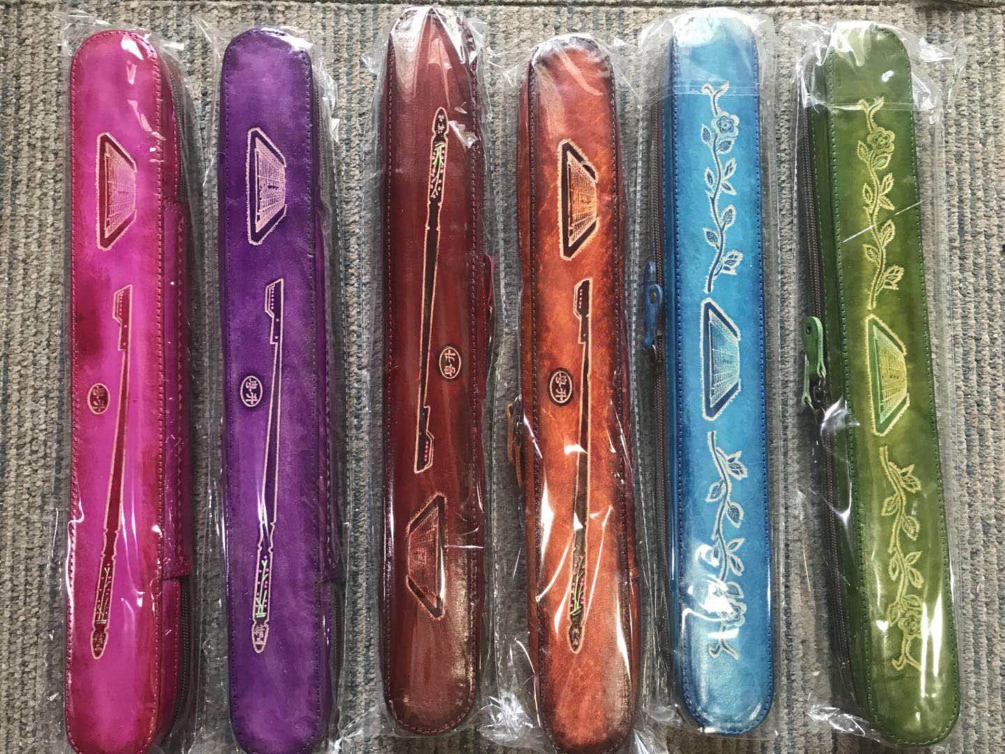 A Cantonese-promoted musical instrument (the leather-violin bamboo bag)