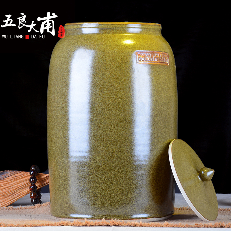 Ceramic jars it oil cylinder storage tank 30 jins 50 kg 100 jins of the big bucket of tea at the end of the cylinder with the tap