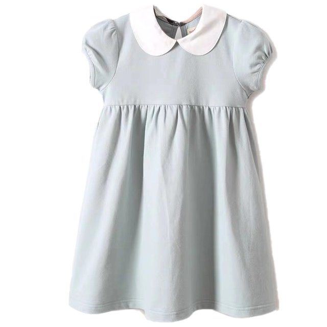 Summer ສີຂາວເດັກນ້ອຍ doll collar ແຂນສັ້ນ dress ຝ້າຍ 2023 ຮູບແບບໃຫມ່ເດັກຍິງເດັກນ້ອຍ princess skirt ແບບອັງກິດ