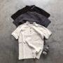 Xu hướng mùa hè Nhật Bản thêu chữ retro màu rắn cổ áo giản dị áo sơ mi POLO nam ngắn tay áo thun nam polo trắng