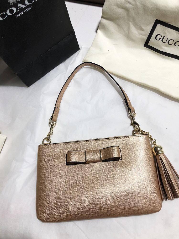 Bow cross grain cowhide mobile phone coin purse Western style light and thin diagonal women's handbag leather wrist bag dual-use