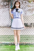 Синяя рубашка, белая юбка с бантиком