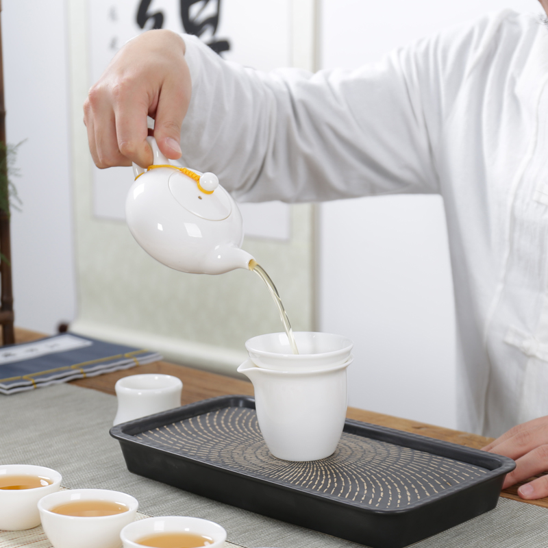 White porcelain kung fu tea set jade suit dehua porcelain teapot teacup of a complete set of ceramic filter tureen tea to wash to the home office