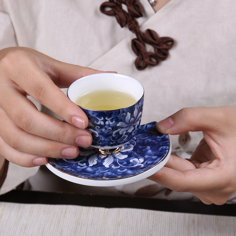 Is a complete set of kung fu tea set of blue and white porcelain household ceramics titian and multi - function electric ceramic furnace into the teapot