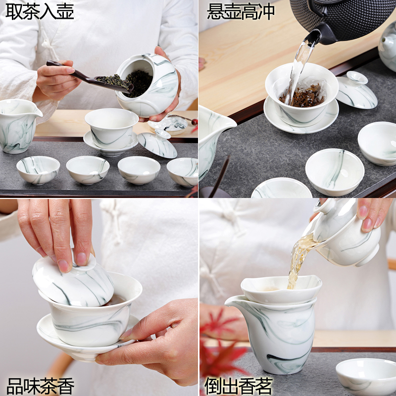 A complete set of ceramic kung fu tea set suits for Chinese style household hand - made teapot teacup tureen tea caddy fixings ink wind