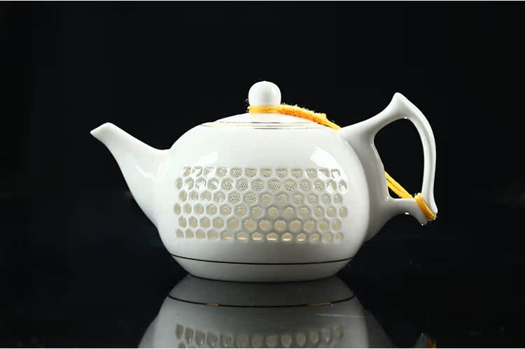 Friend is honeycomb hollow out sea teacups hand - made ceramic teapot tea custom kung fu and exquisite tea sets of a complete set of suits for