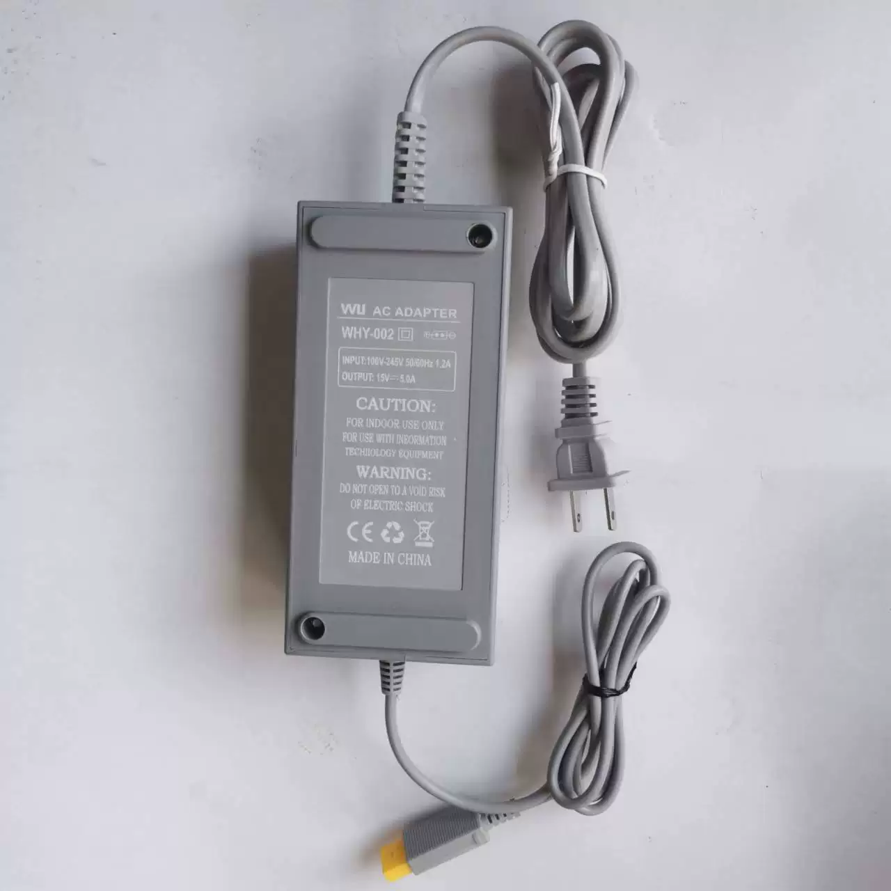 Game console, genuine power supply, power adapters